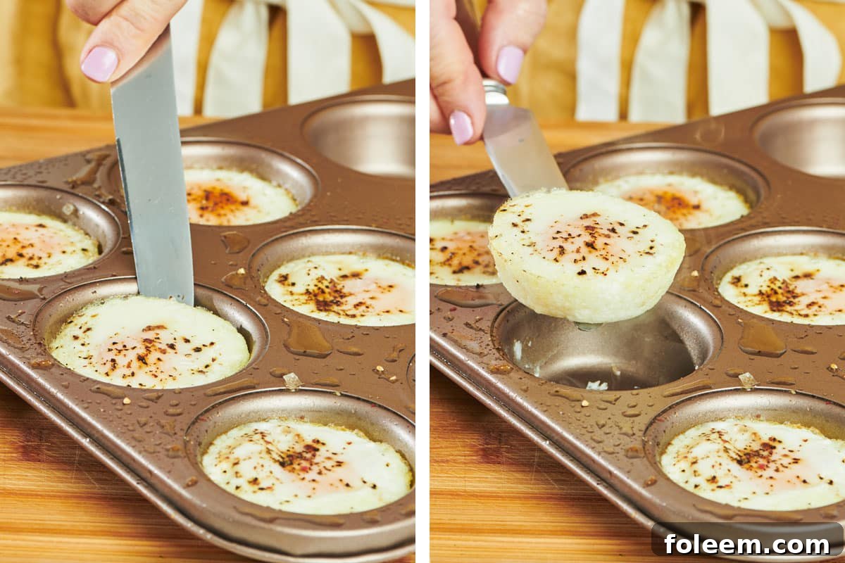Woman removing baked eggs from muffin tin with knife.