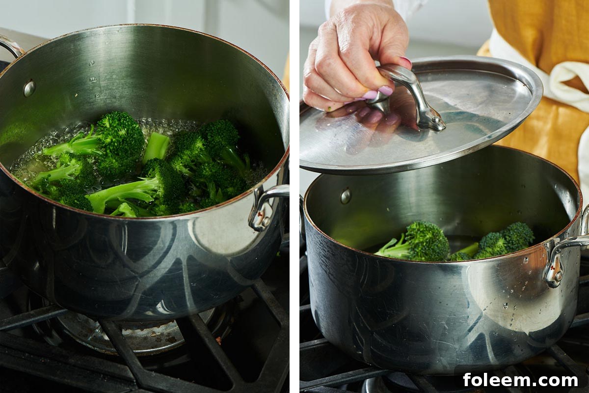 Broccoli steaming in large pot of water.