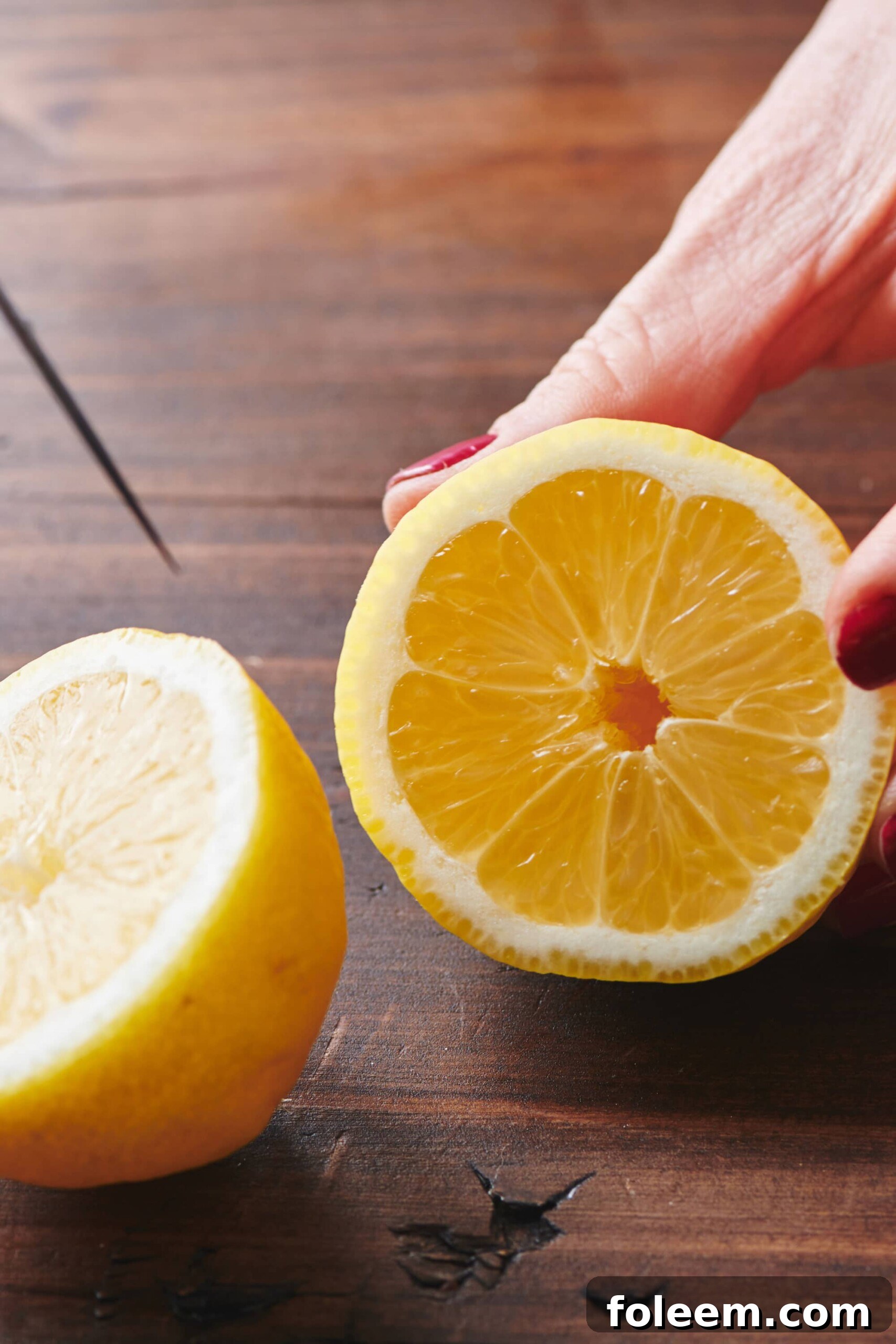 Fresh lemon cut in half.