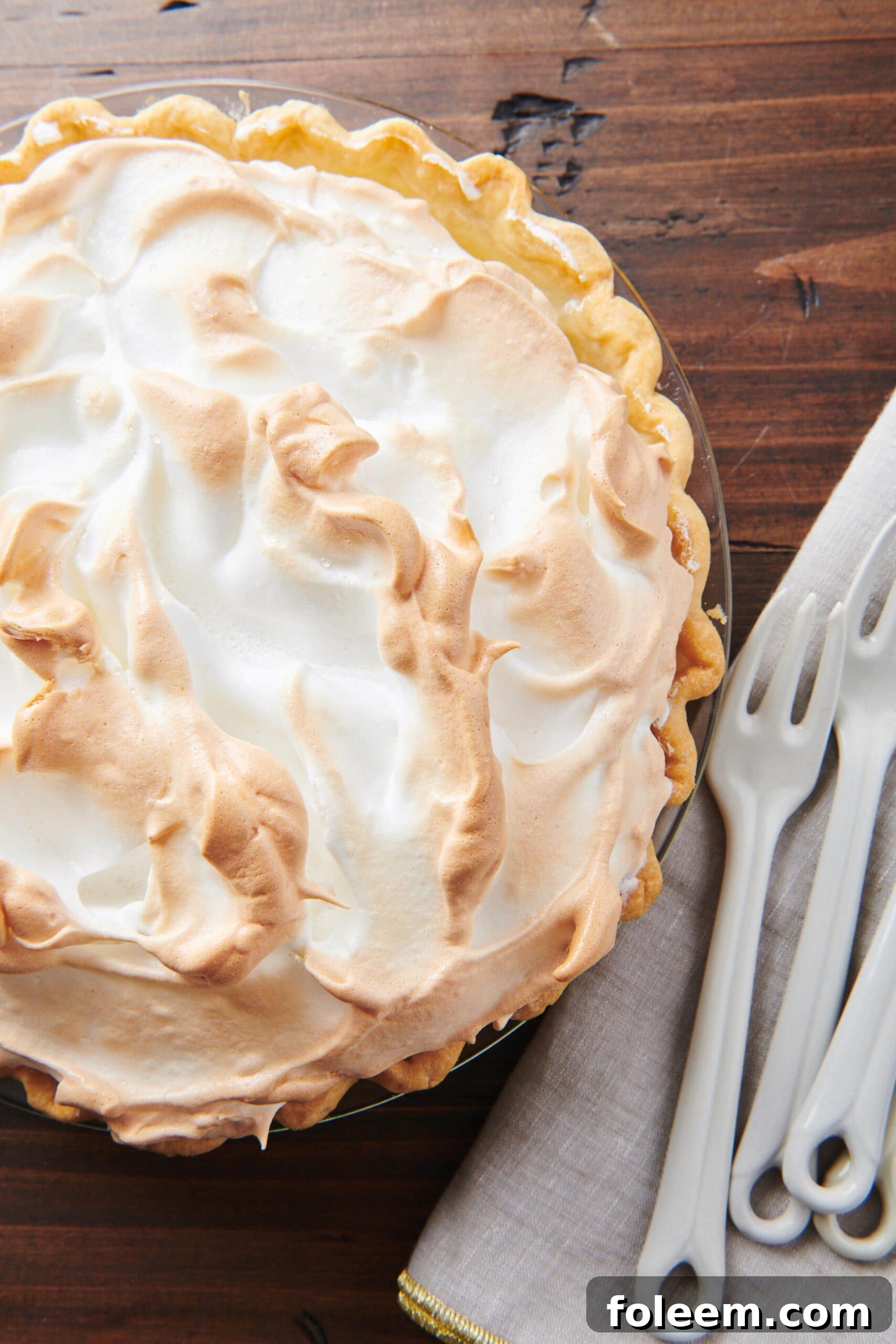 Lemon Meringue Pie on table.